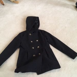 Coat with buttons down the middle